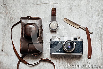 Men's Accessories , top view on a wooden background Retro camera watch razor Stock Photo