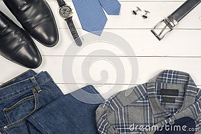 Men's casual clothes and accessories on wooden background Stock Photo