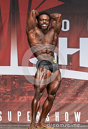 Men`s Classic Physique Champ Flexes at 2018 Toronto Pro Supershow Editorial Stock Photo