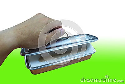 Men`s hand, stainless steel tool tray handle Stock Photo