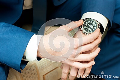 Men`s hands with a watch Stock Photo