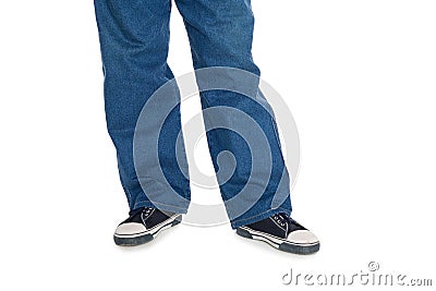 Men's jeans and gumshoes. Stock Photo