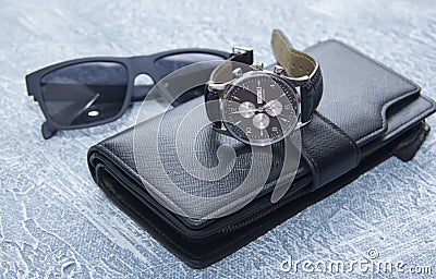 Men's purse, glasses, watch. Mens travel set to holidays Stock Photo