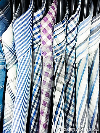 Men`s shirts hanging Stock Photo