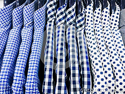 Men`s shirts hanging Stock Photo