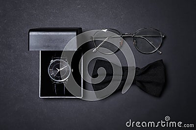 Men set with stylish accessorizes on black background, flat lay Stock Photo