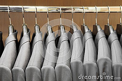 Men suit jackets in apparel store Stock Photo