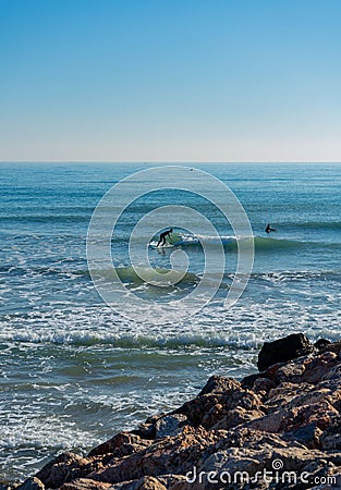 Men surfing in the Mediterranean Sea Editorial Stock Photo