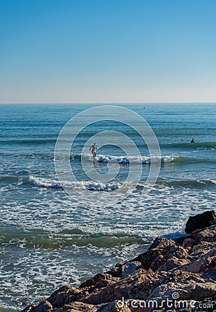 Men surfing in the Mediterranean Sea Editorial Stock Photo