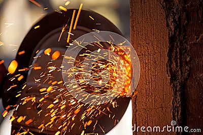 Men at work grinding steel Stock Photo