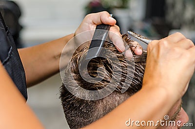 Men's hair cutting scissors in a beauty salon Stock Photo