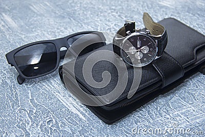 Men's purse, glasses, watch. Mens travel set to holidays Stock Photo