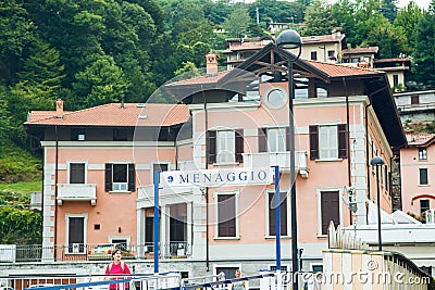 Menaggio. Lake Como. Ferry Pier in the Commune of Menaggio. Lombardy. Signboard with Name of the City Editorial Stock Photo
