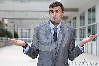 Mendacious businessman expression misunderstanding and confusion Stock Photo