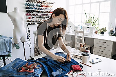 Mending Clothes, how to mend old Clothes. Sustainable fashion, Denim Upcycling Ideas, Using Old Jeans, Repurposing Stock Photo