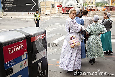 Mennonite girls on pavement in new york city near ground zero Editorial Stock Photo