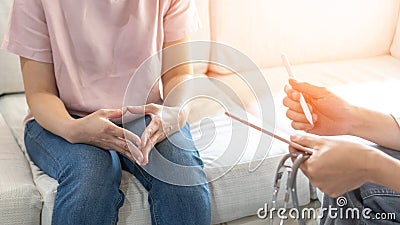 Menopause woman, stressful patient consulting with doctor or psychiatrist who diagnostic examining on obstetric - gynaecological Stock Photo