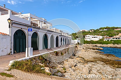 Binibeca Nou, a traditional Spanish fishing village on the coast of Menorca. Spain Editorial Stock Photo
