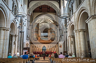 Mens choir performing in a cathedral Editorial Stock Photo