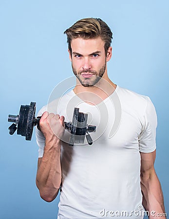Mens power. man lifting barbell. sportsman training in gym. Sport dumbbell equipment. Athletic fitness man. Weight Stock Photo