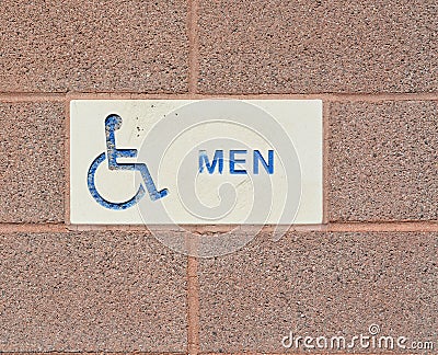 Mens Public Restroom is Handicap Accessible Sign Stock Photo