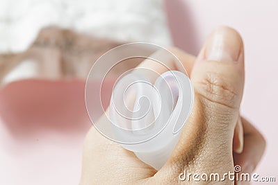 Menstrual cup on pink background, feminine hygiene Stock Photo