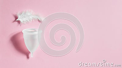 Menstrual cup on pink background, feminine hygiene Stock Photo