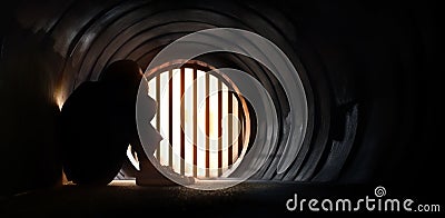 Mental Health Disorder Concept. a Stress, Anxiety, Depressed Person Sitting on the Floor inside the Dark Tunnel , Light at the end Stock Photo