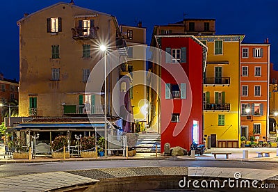 Menton. Antique multi-colored facades of medieval houses. Stock Photo