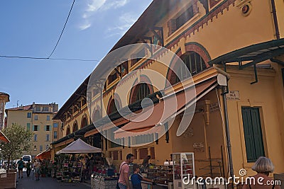 Menton, France - August 8, 2023 - the traditional architecture of the marketplaces Editorial Stock Photo