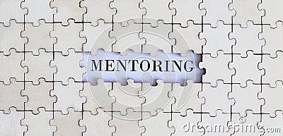 MENTORING.Business concept. White puzzle pieces with different phrases on the white background, top view Stock Photo