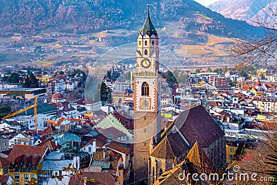 Merano churh of San Nicolo bell tower city centre aerial panoramic view. Merano or Meran is a town in South Tyrol in Stock Photo