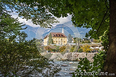 Merano in South Tyrol, a beautiful city of Trentino Alto Adige, View on the famous promenade along the Passirio river. Italy. Editorial Stock Photo