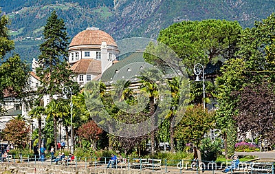 Merano in South Tyrol, a beautiful city of Trentino Alto Adige, View on the famous promenade along the Passirio river. Italy. Editorial Stock Photo