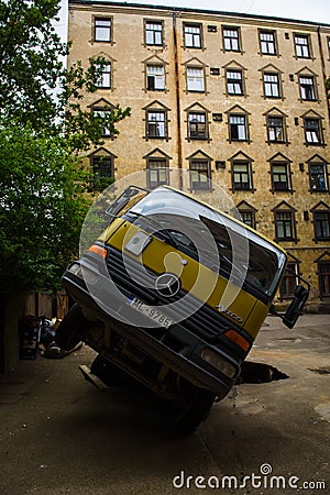 Mercedes Benz Ateco truck with building refuse container crashedcedes Benz Ateco truck with building refuse container crashedcedes Editorial Stock Photo