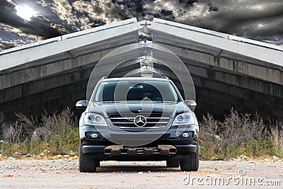 September 18, 2012, Kyiv. Ukraine. Mercedes-Benz ML-Class against the background of a hangar with clouds Editorial Stock Photo