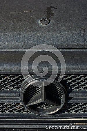 mercedes gelendvagen huge star ornament on the grill and hood mascot on armored film. vehicle of matte black color Editorial Stock Photo