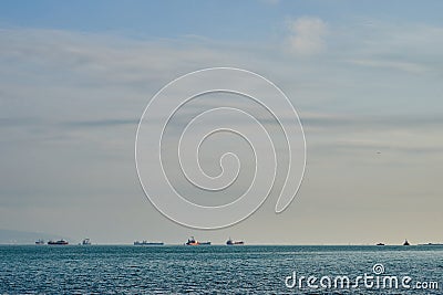 Merchant ships in the sea at anchorage Stock Photo