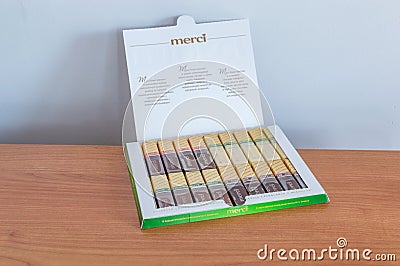 Merci chocolate in open box. Merci is a brand of chocolate candy manufactured by the German company August Storck Editorial Stock Photo