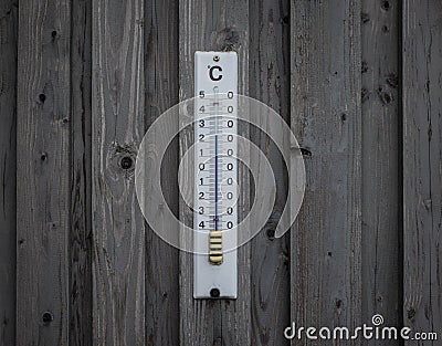 Mercury thermometer Celsius on the wood wall Stock Photo
