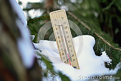 Mercury wooden thermometer Stock Photo