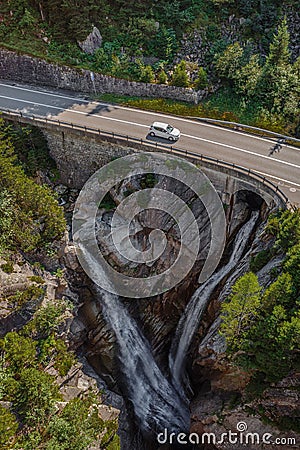 The merging of waterfalls - Furkapass road Stock Photo