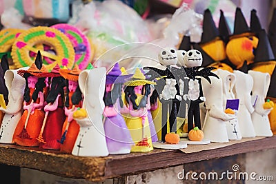 Halloween sugar figurines used for offerings at the altar for `day of the dead` at a market in Merida, Mexico Editorial Stock Photo