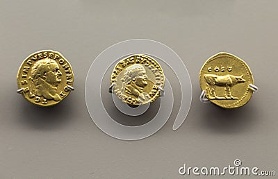 Three golden coins of Titus Emperor Editorial Stock Photo