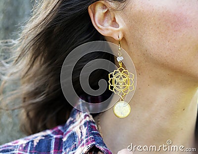 Merkabah Metatron symbol metal earrings Stock Photo