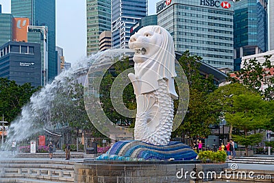 Merlion with skyscraper buildings in Singapore City at noon. Financial district in downtown with business centers in technology Editorial Stock Photo