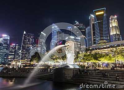 Merlion Statue, the landmark of Singapore with skyscrapers in the background Editorial Stock Photo
