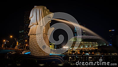 Merlion Statue at night ,the official mascot of Singapore Editorial Stock Photo