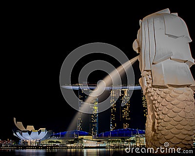 Merlion Statue at night ,the official mascot of Singapore Editorial Stock Photo