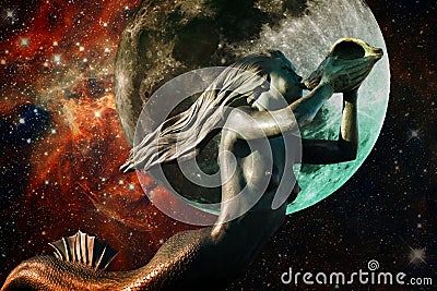 Mermaid, Moon and 30 Doradus Nebula (Elements of this image furn Stock Photo